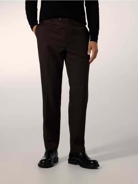 Garniturowe spodnie z wełną - brązowy. Brązowe garnitury Reserved, bez wzorów, z tkaniny. Za 259.99 zł.
