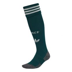 Getry wyjazdowe Real Madryt 26/27. Zielone legginsy długie sportowe Adidas, bez wzorów, z bawełny, do piłki nożnej. Za 99.95 zł.