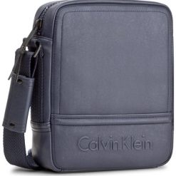 Saszetka CALVIN KLEIN BLACK LABEL - Speed Reporter K50K502152 000. Saszetki i nerki marki Calvin Klein Black Label. W wyprzedaży za 249.00 zł.
