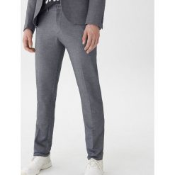 Spodnie garniturowe slim fit - Szary. Garnitury marki Under Armour. Za 129.99 zł.