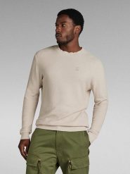 G-Star Sweter w kolorze kremowym rozmiar: M. Brązowe swetry nierozpinane G-Star, m, bez wzorów, z bawełny, bez kołnierzyka, bez ramiączek. Za 185.76 zł.