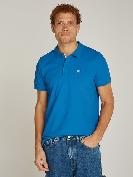 TOMMY JEANS Koszulka polo w kolorze niebieskim rozmiar: 3XL. Niebieskie koszulki polo Tommy Jeans, xl, bez wzorów, z bawełny, bez kołnierzyka, bez ramiączek. Za 171.28 zł.