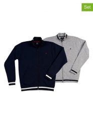 The Time of Bocha Bluzy ( 2 szt.) w kolorze szarym i granatowym rozmiar: L. Niebieskie swetry rozpinane The Time of Bocha, l, bez wzorów, z bawełny, bez kołnierzyka, bez ramiączek. Za 196.70 zł.