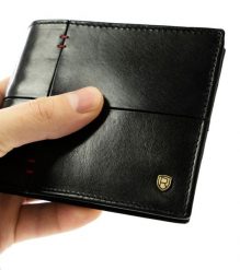 Portfel czarny z czerwonym przeszyciem Rovicky N993-RVTS-6712 BL+RE. Czarne portfele ROVICKY, bez wzorów, ze skóry. Za 80.00 zł.
