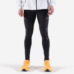 Legginsy do biegania męskie Kiprun Run 900 Rain. Czarne legginsy długie sportowe KIPRUN, l, bez wzorów, z materiału, do biegania. Za 189.99 zł.