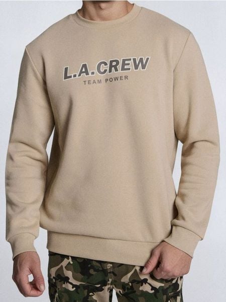 Bluza crewneck z napisem - beżowy. Brązowe bluzy bez kaptura Sinsay, l, bez wzorów, bez kaptura. W wyprzedaży za 15.99 zł.