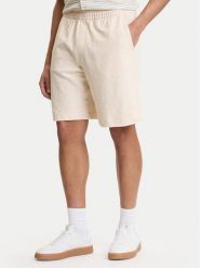 Guess Szorty sportowe M6GD16 K3088 Écru Regular Fit. Krótkie spodenki sportowe Guess, l, z aplikacjami, z bawełny. Za 379.99 zł.