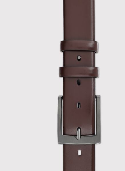 PAKO LORENTE - Ciemnobrązowy skórzany pasek męski. Paski Pako Lorente, bez wzorów, ze skóry. Za 149.99 zł.