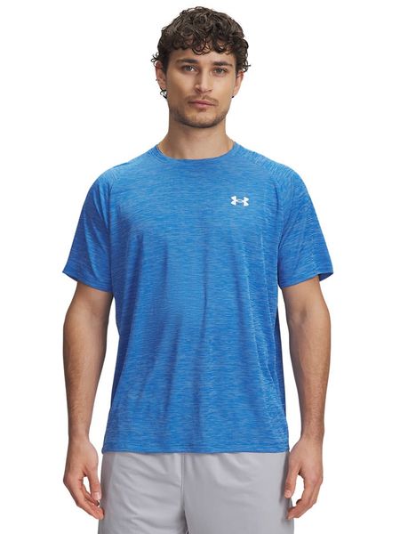 Under Armour Koszulka funkcyjna w kolorze niebieskim rozmiar: XL. Niebieskie t-shirty sportowe Under Armour, bez wzorów, z materiału, bez ramiączek, outdoorowe. Za 83.03 zł.
