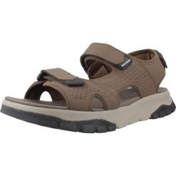 Sandały SKECHERS WAGNER AVALON Brązowy. Brązowe sandały Skechers, z syntetyku, bez zapięcia. Za 243.99 zł.