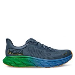 Buty do biegania Hoka. Niebieskie buty do biegania HOKA, bez wzorów, bez zapięcia, do biegania. Za 599.99 zł.