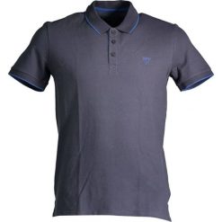 Koszulka polo w kolorze ciemnoszarym. Koszulki polo marki Guess, z aplikacjami, polo, z krótkim rękawem. W wyprzedaży za 169.95 zł.