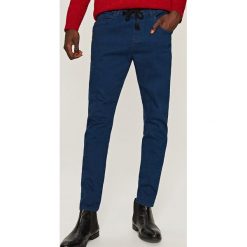 Joggery slim fit - Niebieski. Jeansy marki Reserved. W wyprzedaży za 39.99 zł.