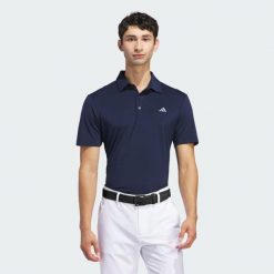Koszulka polo Ultimate365 Solid. Niebieskie koszulki polo Adidas, m, bez wzorów, z materiału, bez kołnierzyka, bez ramiączek. Za 259.00 zł.