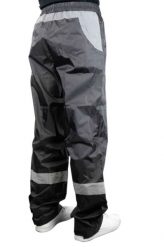 Spodnie przeciwdeszczowe rowerowe Waterproof o wysokiej widoczności. Czarne spodenki rowerowe R'FLECT, l, bez wzorów. Za 218.50 zł.
