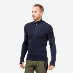 Koszulka męska trekkingowa z długim rękawem Forclaz MT900 merino. Niebieskie bluzki z długim rękawem FORCLAZ, l, bez wzorów, z dzianiny, bez kołnierzyka, bez ramiączek. Za 299.99 zł.