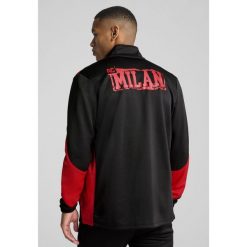 Męska kurtka AC Milan ftblNRGY+ PUMA Black For All Time Red. Czarne kurtki Puma, m, bez wzorów, bez kaptura. W wyprzedaży za 260.50 zł.