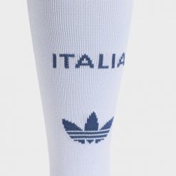 Getry wyjazdowe Włochy 26. Niebieskie legginsy długie sportowe Adidas, bez wzorów, do piłki nożnej. Za 99.95 zł.