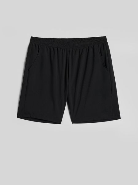 4F Spodenki treningowe szybkoschnące męskie - czarne M. Czarne krótkie spodenki sportowe 4F, l, bez wzorów, z dzianiny. Za 99.99 zł.