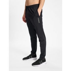 Jogging Hummel TE Strength. Czarne spodnie materiałowe Hummel, na co dzień, s, bez wzorów, z dresówki, sportowe. Za 183.00 zł.