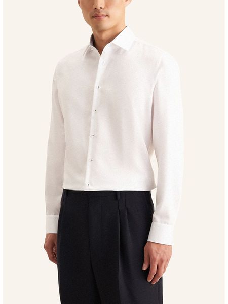 Seidensticker Koszula w kolorze białym rozmiar: 40. Białe koszule Seidensticker, bez wzorów, z bawełny, bez kołnierzyka, bez ramiączek. Za 104.39 zł.