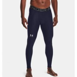 Legginsy szybkoschnące męskie Under Armour HG Armour Leggings. Niebieskie legginsy długie sportowe Under Armour, m, bez wzorów, do biegania. Za 140.99 zł.