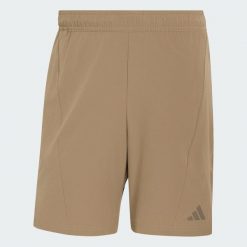Szorty Designed for Training Workout. Zielone krótkie spodenki sportowe Adidas, l, bez wzorów, z elastanu. Za 199.00 zł.
