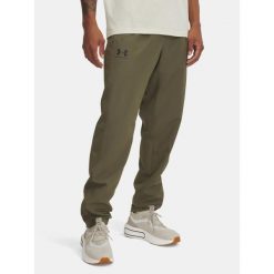 Spodnie treningowe męskie Under Armour Rival Woven Windbreaker Pant marine. Zielone buty treningowe Under Armour, bez wzorów, na fitness i siłownię. Za 159.99 zł.
