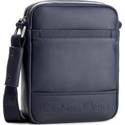 Saszetka CALVIN KLEIN - Bennet Reporter K50K503278 411. Saszetki i nerki marki CALVIN KLEIN. W wyprzedaży za 259.00 zł.
