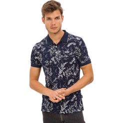 Koszulka polo w kolorze granatowo-kremowym. Koszulki polo marki Galvanni. W wyprzedaży za 74.95 zł.