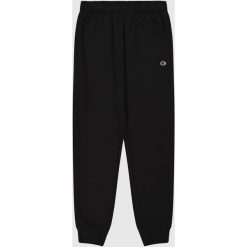 Spodnie Champion Spodnie Z Mankietem Z Prążkowanej Dzianiny Dorośli. Czarne spodnie treningowe długie Champion, m, bez wzorów, z bawełny. Za 129.00 zł.