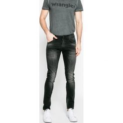 Wrangler - Jeansy Bryson. Jeansy marki Wrangler. W wyprzedaży za 219.90 zł.