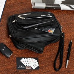 Czarna Saszetka męska skórzana do ręki na dokumenty Beltimore G25. Czarne torby na ramię Beltimore, bez wzorów, do ręki, bez dodatków. Za 99.90 zł.