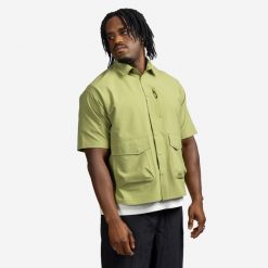Koszula z seersuckera unisexe, Lifetech. Zielone koszule Decathlon, na wiosnę, l, bez wzorów, ze skóry, bez kołnierzyka, bez ramiączek. Za 149.99 zł.