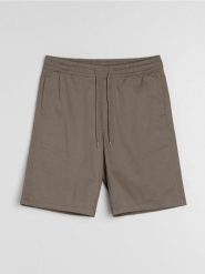 Bawełniane szorty jogger - brązowy. Brązowe krótkie spodenki sportowe Sinsay, l, bez wzorów, z bawełny. W wyprzedaży za 29.99 zł.