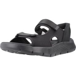 Sandały SKECHERS SLIP-INS GO WALK FLEX Czarny. Czarne sandały Skechers, z tkaniny, bez zapięcia. Za 298.99 zł.