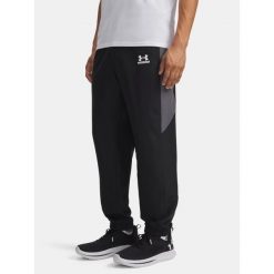 Spodnie męskie Under Armour Tech Sport black/castlerock/white. Czarne spodnie treningowe długie Under Armour, m, bez wzorów. Za 299.99 zł.