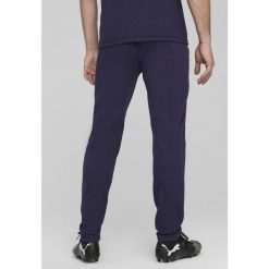 Męskie spodnie Casuals FC Red Bull Salzburg PUMA Navy Red Blue. Czerwone spodnie materiałowe Puma, l, bez wzorów, z dresówki, sportowe. W wyprzedaży za 174.00 zł.
