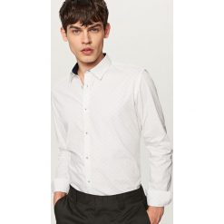 Koszula z podwijanymi rękawami slim fit - Jasny szar. Koszule marki Under Armour. W wyprzedaży za 59.99 zł.