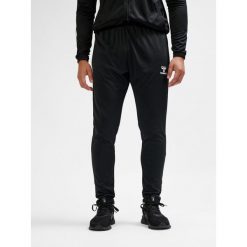 SPODNIE hmlESSENTIAL TRAINING PANTS. Czarne spodnie treningowe długie Hummel, m, bez wzorów, z dresówki. Za 150.00 zł.