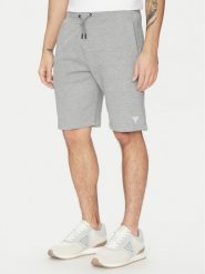 Guess Szorty sportowe Z2YD04 KAIJ1 Szary Regular Fit. Szare krótkie spodenki sportowe Guess, l, z aplikacjami, z bawełny. Za 249.99 zł.