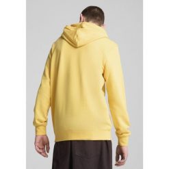 Męska bluza z kapturem Essentials z dwukolorowym logo No. 1 PUMA Sunny Yellow. Żółte bluzy z kapturem Puma, m, bez wzorów, z gumy, z kapturem. Za 209.30 zł.