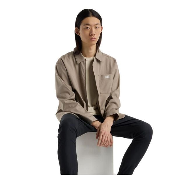Męska kurtka letnia New Balance Squad Mag. Brązowe kurtki New Balance, na lato, m, bez wzorów, z materiału, bez kaptura. Za 902.99 zł.