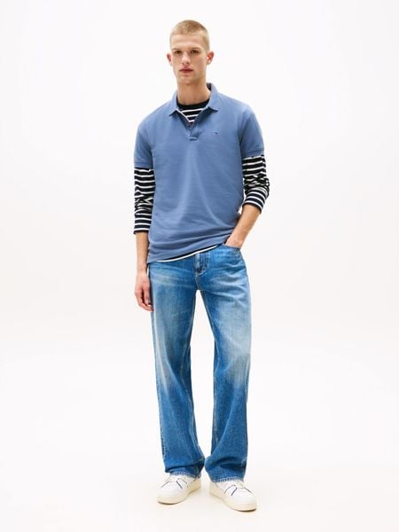 TOMMY JEANS Koszulka polo w kolorze błękitnym rozmiar: M. Niebieskie koszulki polo Tommy Jeans, m, bez wzorów, z bawełny, bez kołnierzyka, bez ramiączek. Za 200.13 zł.