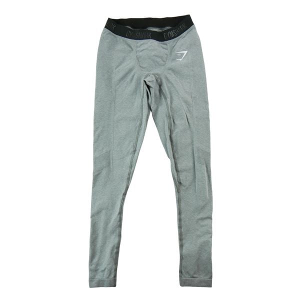 Second life - Legginsy męskie Gymshark szare - Stan bardzo dobry. Szare legginsy długie sportowe GYMSHARK, l, bez wzorów, z materiału, do biegania. Za 127.76 zł.
