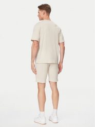 Jack & Jones Komplet t-shirt i spodenki Archive 12297642 Beżowy Relaxed Fit. Brązowe krótkie spodenki sportowe Jack & Jones, m, bez wzorów, z bawełny. Za 149.99 zł.