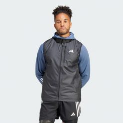 Bezrękawnik Own the Run. Czarne kurtki softshell Adidas, s, bez wzorów, z materiału, bez kaptura. Za 255.55 zł.