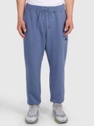 4F Spodnie dresowe w kolorze niebieskim rozmiar: XL. Niebieskie spodnie treningowe długie 4F, xl, bez wzorów, z dresówki. Za 74.46 zł.