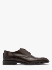 Ciemnobrązowe półbuty z ozdobnym noskiem RICO. Brązowe eleganckie półbuty Ryłko, bez wzorów, ze skóry, bez obcasa, bez zapięcia. Za 429.99 zł.