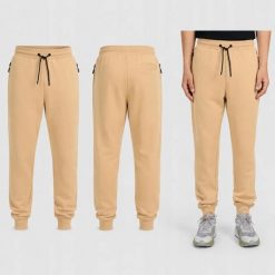 SPODNIE MĘSKIE DRESOWE 4F JOGGERY SPORTOWE BEŻOWE. Brązowe joggery i bojówki 4F, m, bez wzorów, z bawełny, sportowe. Za 149.99 zł.